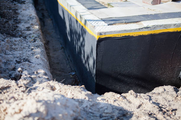 Professional Waterproofing technician working in Bloomington, MN